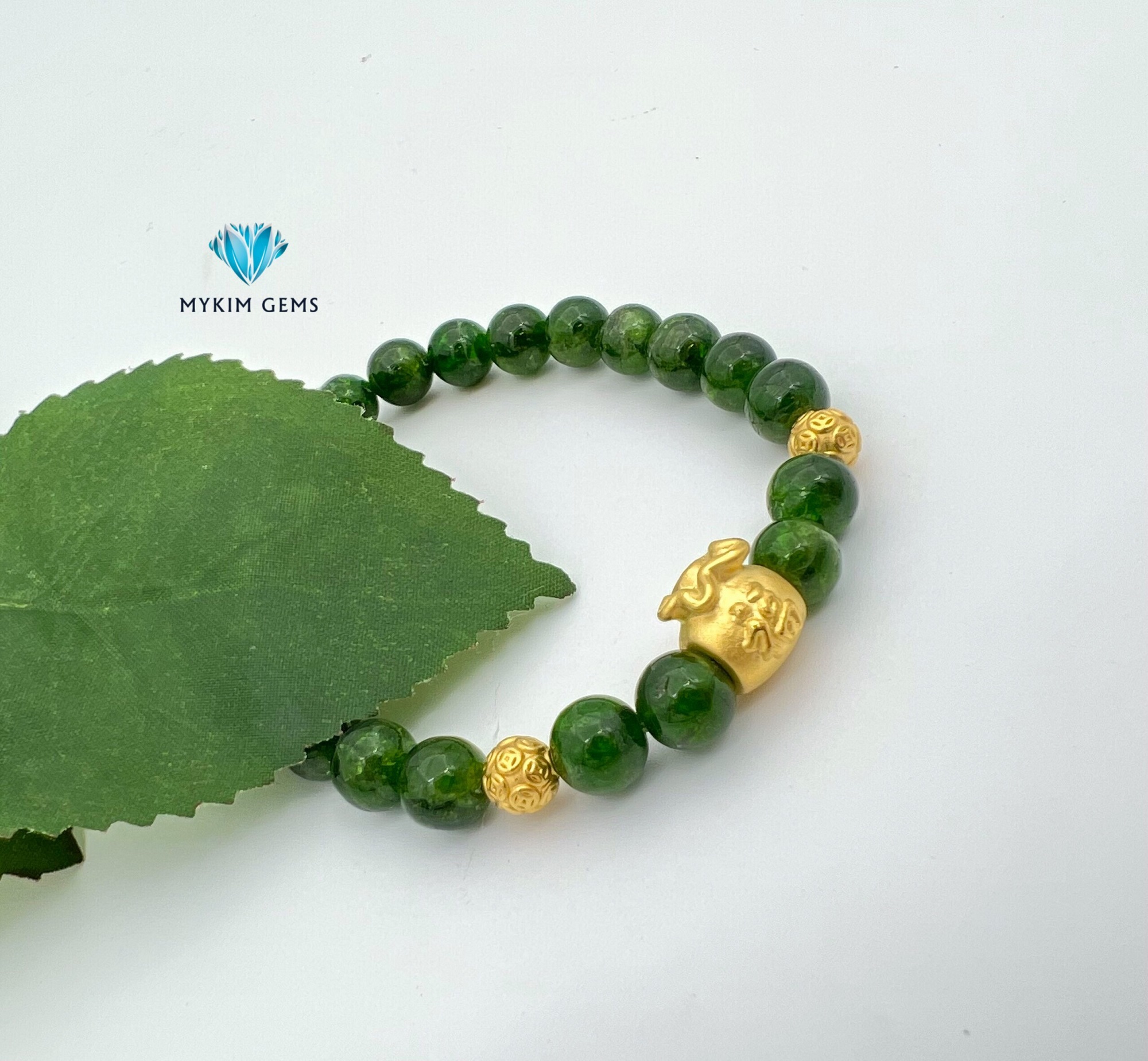 Vòng Đá Diopside A 8mm mix charm túi tài lộc vàng 24k