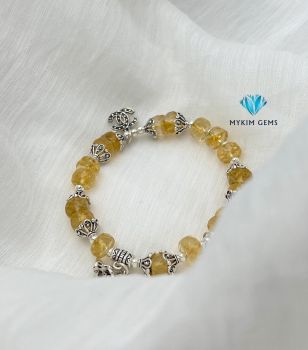 Vòng Thạch Anh Vàng cắt giác mix charm bạc