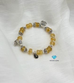 Vòng Thạch Anh Vàng cắt giác mix charm bạc
